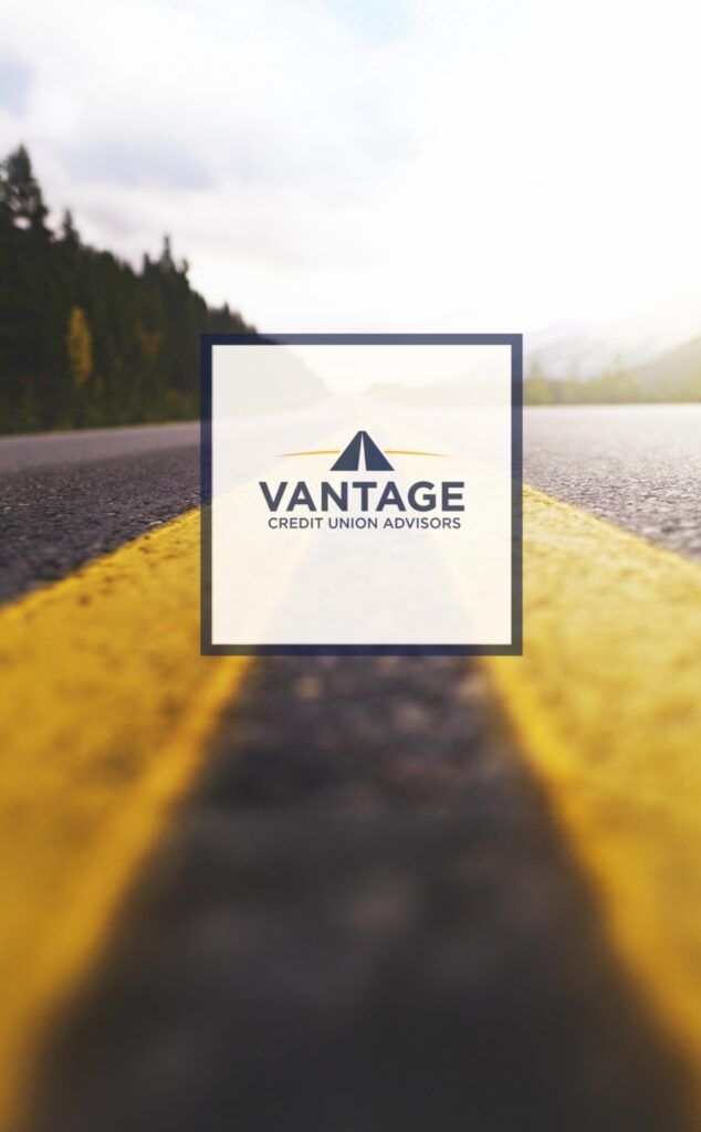 Vantage Credit Union Advisors logo centered on a road with yellow lines leading toward the horizon.