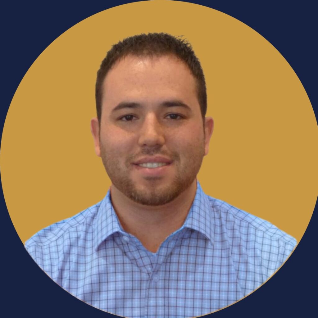 Portrait of Matthew Esquivel, a professional in a light blue checkered shirt, smiling against a gold and navy circular background.